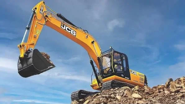Our JCB poclain excavator at work on rock